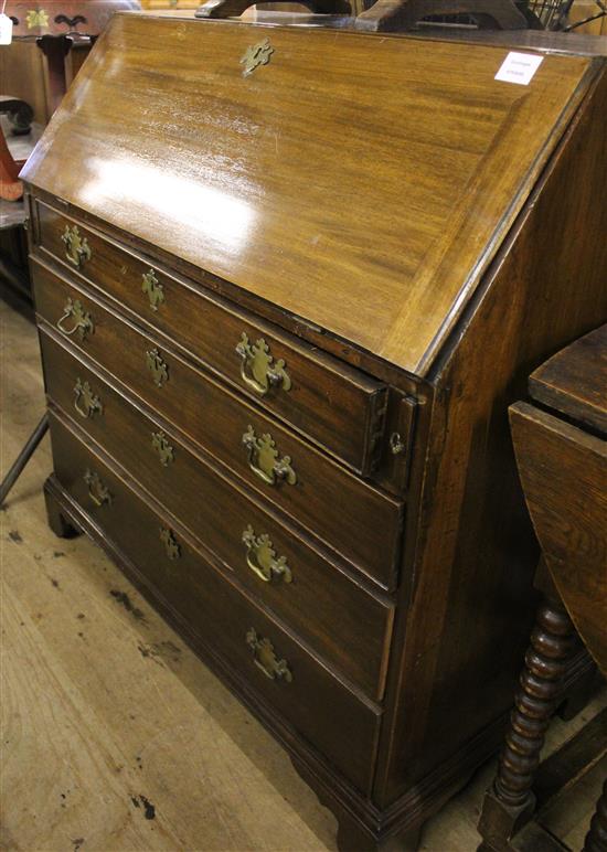 George III mahogany bureau, fitted four long drawers(-)